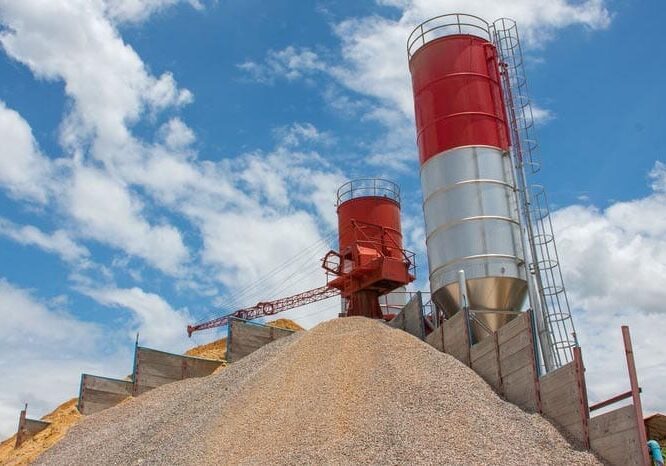 concrete batching plant, heap of sand and gravel, cement material stationary