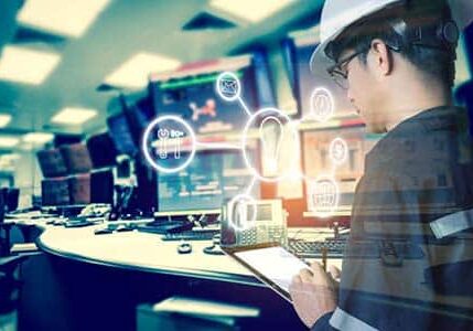 Double exposure of Engineer or Technician man with business industrial tool icons while using tablet with monitor of computers room  for oil and gas industrial business concept.