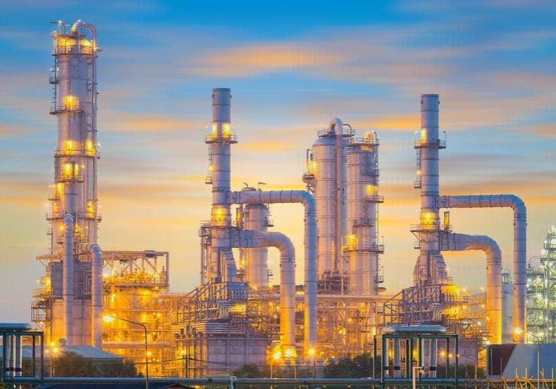 Oil refinery factory at twilight.